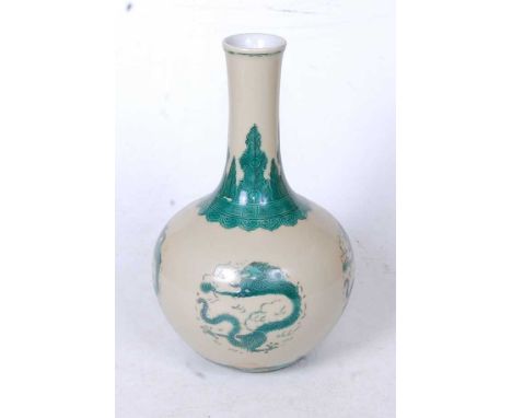 A Chinese porcelain bottle vase, having a slender neck to a bulbous lower body, enamel decorated with green dragons, having r