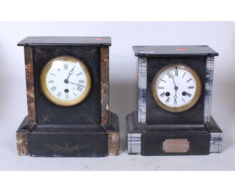 A late Victorian black slate and grey marble mantel clock having an enamel dial with Roman numerals and eight day movement, w