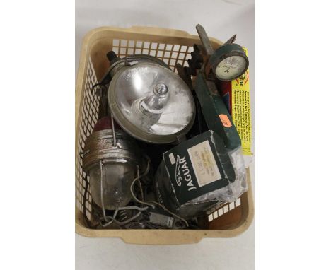 A collection of car parts to include Lucas headlamps
