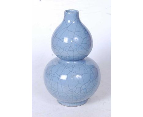 A Chinese blue crackle glazed double gourd vase, having blue seal mark verso, height 24cm