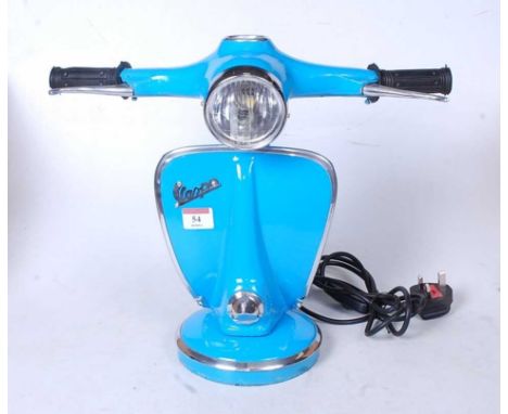 A modern table lamp in the form of a Vespa Scooter, height 36cm