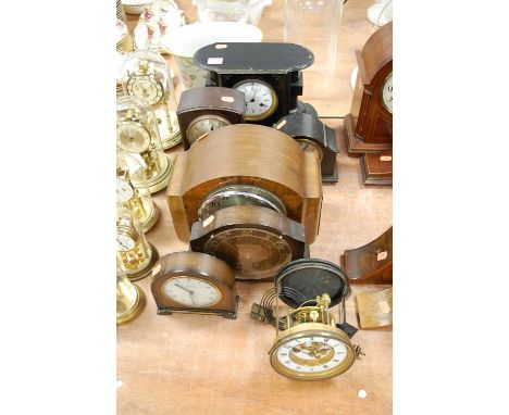 A 1930s walnut cased mantel clock having a silvered dial with Arabic numerals and chiming movement, together with various oth