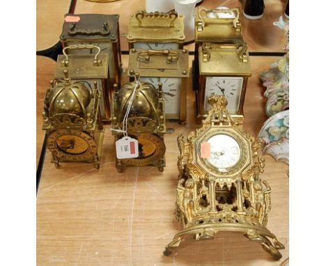 A Smiths English Clocks Limited lantern type clock, having a domed bell with strapwork and circular dial with Roman numerals,