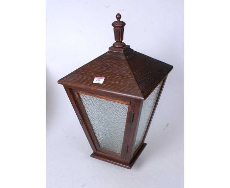 A mid-20th century oak framed and glazed hall light pendant, of square tapered form, h.58cm.