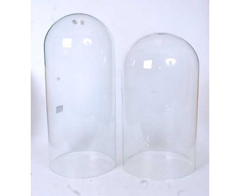 A large Victorian glass clock dome, h.46cm; together with one other slightly smaller example (2)