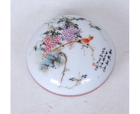 A Chinese export jar and cover, of domed circular form, the cover enamel decorated with a bird amidst flowers and foliage, wi