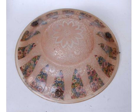 An early 20th century pink tinted glass ceiling light shade, of circular domed form, etched with flowers, having further colo