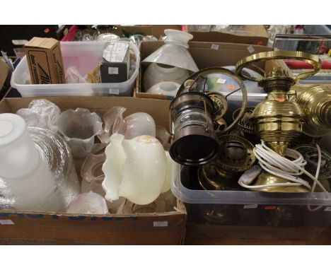 Four boxes of various lighting effects to include; sundry converted brass oil lamps (now to electricity), numerous domed shad