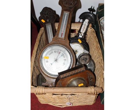 An oak two dial wheel barometer, mid-20th century; together with various other barometers and barometer accessories (some a/f