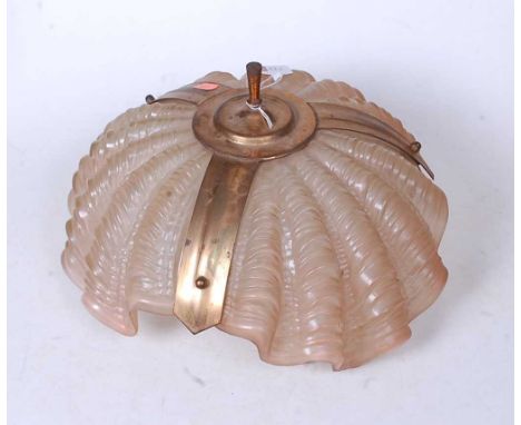 A 1930s pink tinted moulded glass and brass mounted ceiling light fitting, of shell shape, 33cm