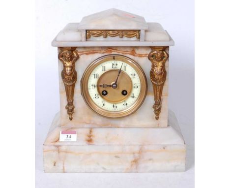 A late Victorian alabaster cased mantel clock, of architectural form with Egyptian revival type gilt metal mounts, having a s