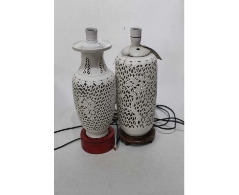 A modern Chinese blanc-de-chine stoneware table lamp; together with one other similar example (2)