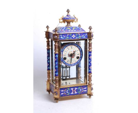 A reproduction gilt brass and enamel four glass mantel clock, having an unsigned polychrome decorated dial, twin winding hole