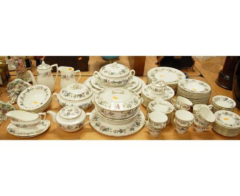 A Royal Worcester twelve-place setting tea and dinner service, in the June Garland pattern