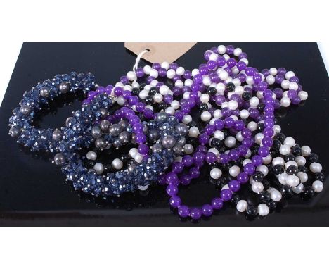 Four modern glass necklaces to include faux amethyst and cultured pearl example