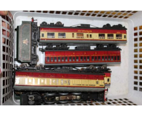 One box containing 4 trays and some loose track, 26 unboxed Hornby 00 loose wagons, 4 coaches and a "Duchess of Montrose" eng