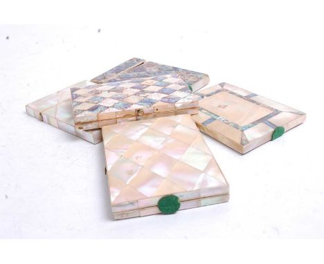 A collection of five various Victorian mother of pearl and abalone shell visiting card cases 
