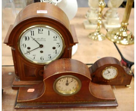 A mahogany cased dome top mantel clock, the circular dial with Arabic numerals, signed Seth Thomas, Westminster Chime, height