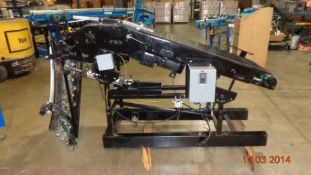 Rapistan Inclined Power Belt Conveyor Combined with a Air Cylinder Activated Hinged Wheel Conveyor -