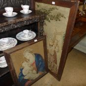 A pair of needlework religious studies in oak frames