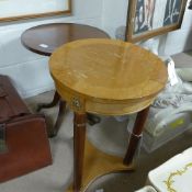 A Biedemeier style occasional table on cylindrical support and similar table