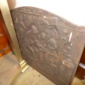 A cast iron fire back