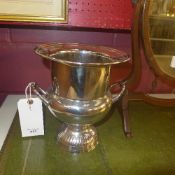 A pair of silver plated campana form wine coolers
