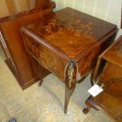 A C19th French rosewood occasional table well inlaid to the four drop leaf top gilt metal mounts