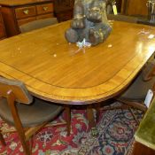 A Regency mahogany breakfast table the crossbanded top raised on quadruped supports W 150 D 115 H 72