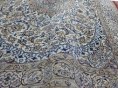 An extremely fine central Persian part silk Nain carpet central pendant petal medallion surrounded