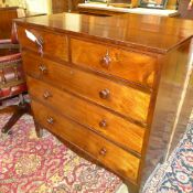 A Victorian mahogany chest having two short above three long drawers on bracket feet