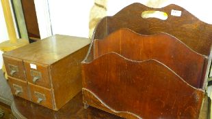 An Art Deco magazine rack and 1920's table top four drawer filing unit and a pine clothes washer