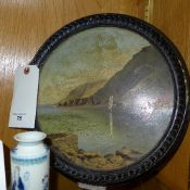 A Watcombe Torquay painting on terracotta plaque depicting coastal scene
