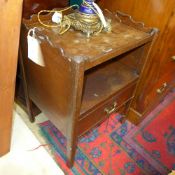 A George III mahogany commode the tray top above shelf and drawer