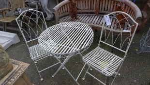 A white painted garden bistro set