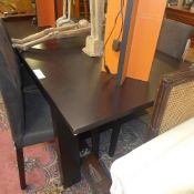 A Heals oak veneered extending dining table on square section supports