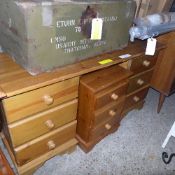 A pine pedestal desk and a pine bedside chest