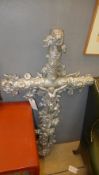 A French C19th cast iron Corpus Christi  with rose head relief W 75 L 143 cm