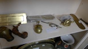 A collection of brass door plates, knockers and others