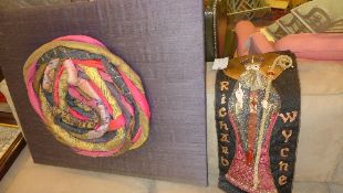 A multi coloured portrait, embroidery and an abstract embroidery