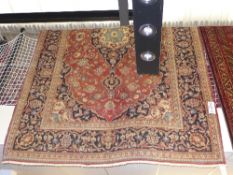 A fine central Persian Kashan carpet pendant petal medallion surrounded by flowers and palmettes