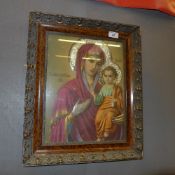 A Russian icon with white metal embellishments