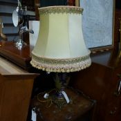 A late Victorian porcelain and gilt metal table lamp whit shade