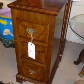 A pair of C20th walnut bedside chest having three drawers on bracket feet