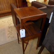 A C19th mahogany two tier night table with drawer on slender supports
