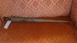 A vintage hardwood weaving stick