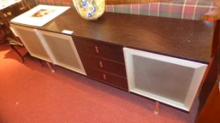 A contemporary Italian designer black laquered sideboard with three frosted glass doors flanking