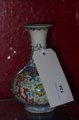 A Chinese Doucai vase glased with dragons and foliate decoration