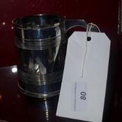 A silver plated tankard