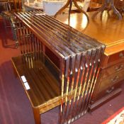 A contemporary designer chromed console table of slatted form